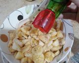 A picture of step 12 of Aloo chaat and kharboonana chaat.