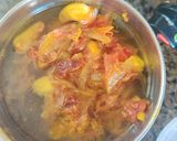 A picture of step 10 of Prawn curry.