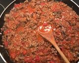 A picture of step 8 of Cheese and Spinach stuffed Cannelloni with a meat ragù.