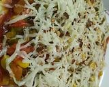 A picture of step 2 of Veg pizza.