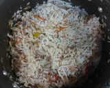 A picture of step 2 of Chicken egg fried rice with noodles.