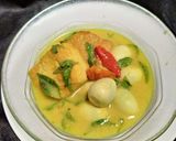 Foto langkah ke 9 dari resep Opor tahu telur puyuh wangi kemangi.