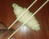 A picture of step 7 of Spicy croissants with chocolate filling.