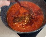 Foto del paso 5 de la receta: Manitas de cerdo en salsa con garbanzos