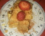 Foto del paso 7 de la receta: Arrollado de Vainillas, relleno de postre de vainilla y frutilla