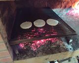 Foto del paso 6 de la receta: Provoleta asada con papas bravas