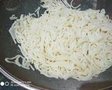 A picture of step 1 of Egg Noodles.