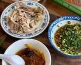 A picture of step 6 of Steamed Herbal Chicken.