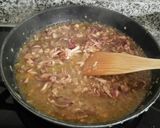 Foto del paso 2 de la receta Calamares rellenos y en su tinta con guarnición de arroz