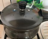 A picture of step 3 of Masala Moong in cooker.