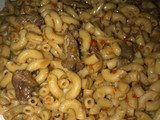 Brown macaroni with beef meat