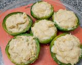 Foto del paso 4 de la receta: Zapallitos rellenos con cebolla y salsa blanca