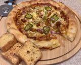 A picture of step 8 of Stuffed crust chicken fajita pizza🍕🧀.