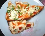 A picture of step 4 of Chicken loaf sandwich with white sauce.