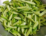 A picture of step 2 of Tindora sabji with peanut and sesame massala.