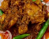 A picture of step 11 of Chicken Tandoori Masala with Paratha.
