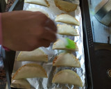 Foto del paso 3 de la receta: Empanadillas al horno con huevo, atún y tomate