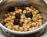 A picture of step 7 of Black Date, Snow Fungus, and Lotus Seed Sweet Soup.