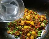 A picture of step 6 of Qeema Matar Alo.