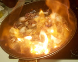 Foto del paso 4 de la receta: Calamarcitos Flambeados en aceite de oliva aromarizado con Ajo