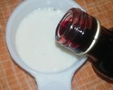 A picture of step 3 of Red Velvet çhoçolate inside Cupcakes with cream cheese frosting.