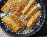 Foto del paso 3 de la receta Canutillos de embutido con tomate seco y hierbabuena