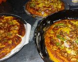 A picture of step 6 of Hawaaain pizza.