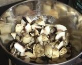 A picture of step 2 of Garlic Mushrooms Green Peas and Sweet-Corn Fried Rice.