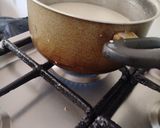A picture of step 4 of Arroz con Coco.