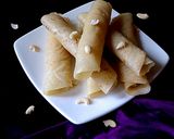 A picture of step 9 of Kheer'r Patishapta pithe (a traditional Bengali sweet delicacy).