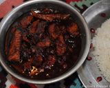 A picture of step 15 of Khoresht-e Fesenjan ( Pomegranate stew with chicken and walnut.