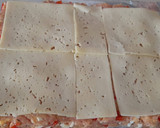 Foto del paso 3 de la receta: Enrollado de carne con jamón y queso