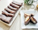 Foto langkah ke 6 dari resep Dadar Gulung Coklat Pisang Keju.
