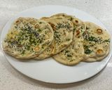 A picture of step 8 of Onion seeds, garlic, parsley and butter naan.