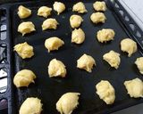 Foto del paso 7 de la receta: Bombas rellenas de dulce de leche y baño de chocolate