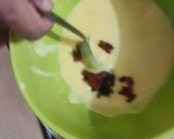 A picture of step 2 of Custard tutty futty cake.