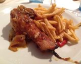 Foto del paso 3 de la receta: Pollo a la naranja con fritas