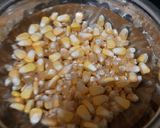 A picture of step 1 of Mall PVR style spicy corn black salt butter masala.