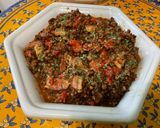 Une image de l'étape 12 de Lentilles brunes aux poivrons rouges et lard fumé.