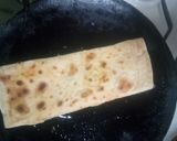 A picture of step 3 of Spicy omelette stuffed 'roti'.