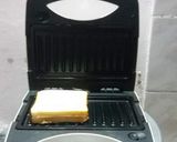 A picture of step 2 of Veg cheese grilled sanwich.