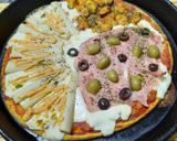 Foto del paso 6 de la receta: Pizza con mejillones, palmitos, jamón