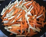 A picture of step 2 of Celeriac and carrot Kinpira.