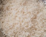 A picture of step 1 of Meetha Chawal (Sweet Yellow Rice).