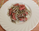 Foto del paso 13 de la receta: Salchichas minis con gulas al ajillo y calabacín al horno