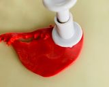 A picture of step 2 of How to use gold leaf with fondant.