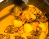 A picture of step 4 of Chicken in spicy coconut gravy with potatoes #WYH (VERY SPICY).