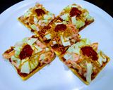 A picture of step 1 of Cracker Pizza Bites.