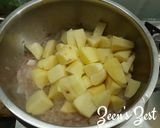 A picture of step 1 of Long Purple Brinjal and Potatoes Sabzi.