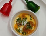 A picture of step 10 of Raw banana peanut kofta curry.